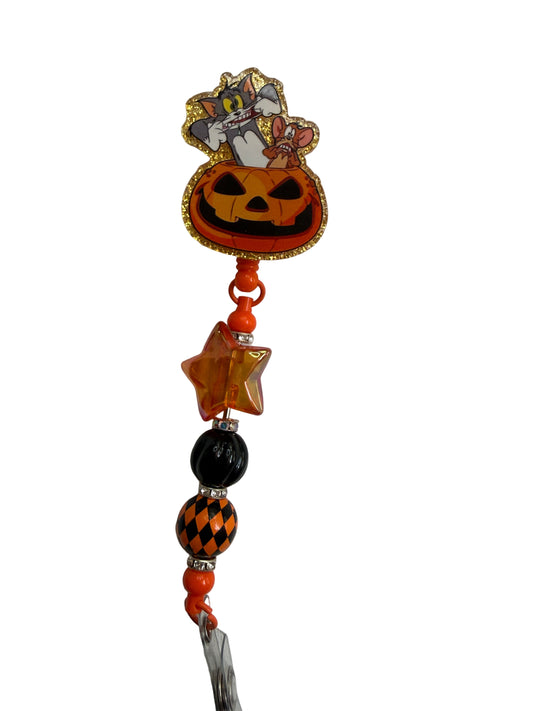 Tom & Jerry Pumpkin Drip Badge Reel - Uglybae