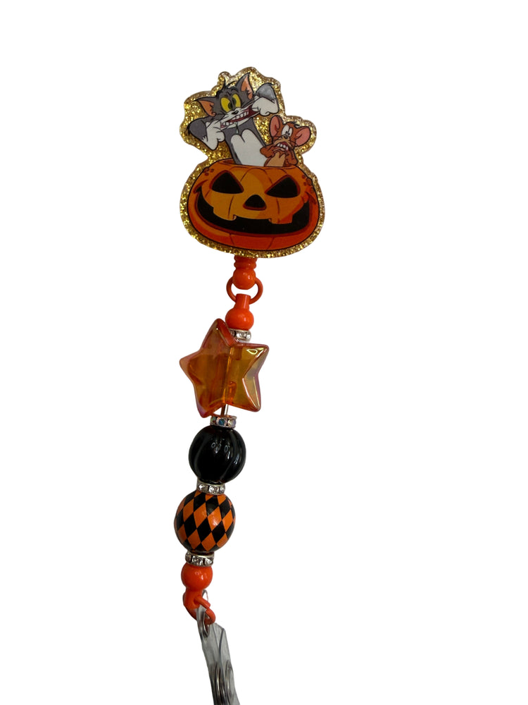 Tom & Jerry Pumpkin Drip Badge Reel - Uglybae