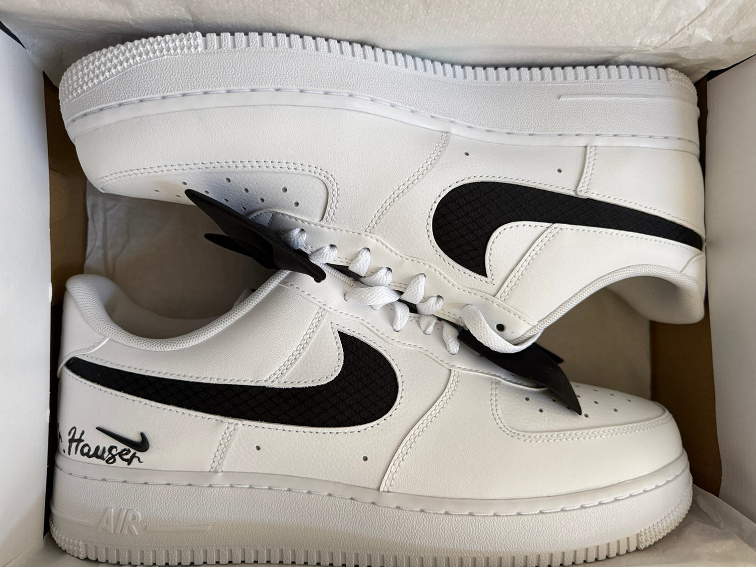 Black and white personalized custom sneakers with name detail
