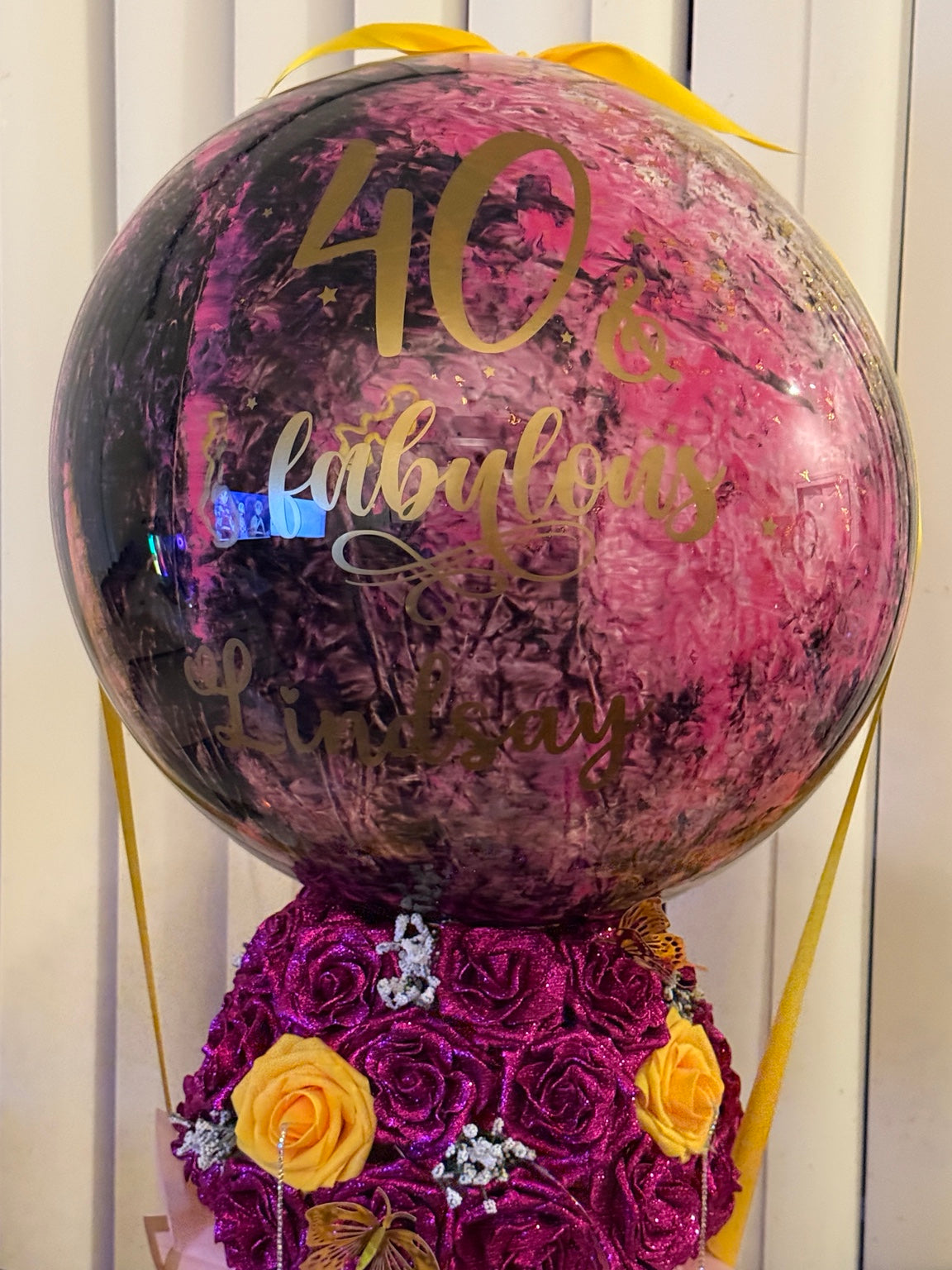 Made-to-order custom wine bottle bouquet with personalized bubble balloon and roses