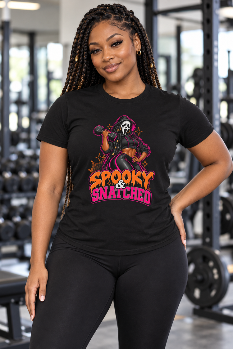 Model wearing the Spooky and Snatched Halloween workout tee in a gym